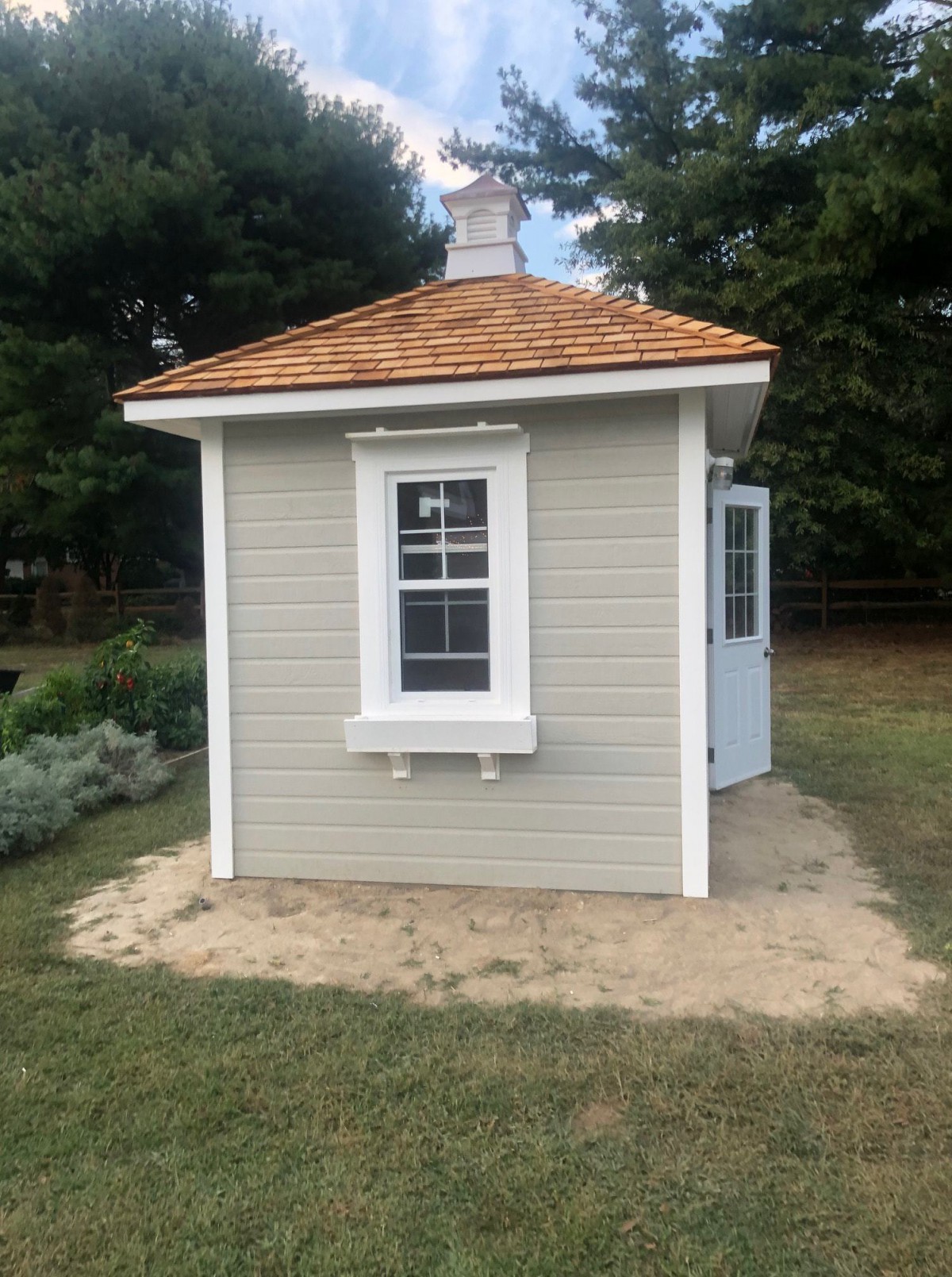 Backyard cedar Sonoma shed plan 8' x 8' featuring a cupola on the top as seen from side profile. Id number 5752.