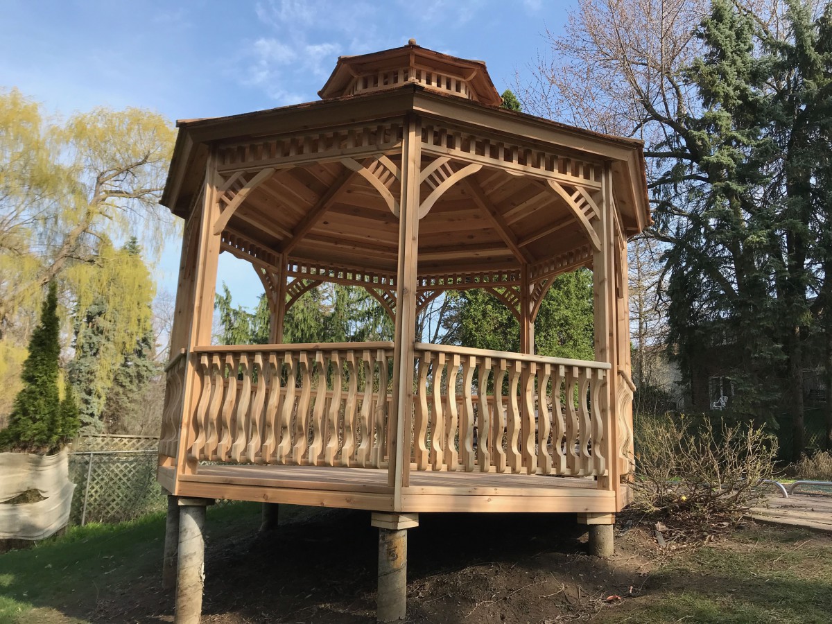 Backyard gazebo design 12' featuring Victorian roof design as seen from the rear side. Id number 57