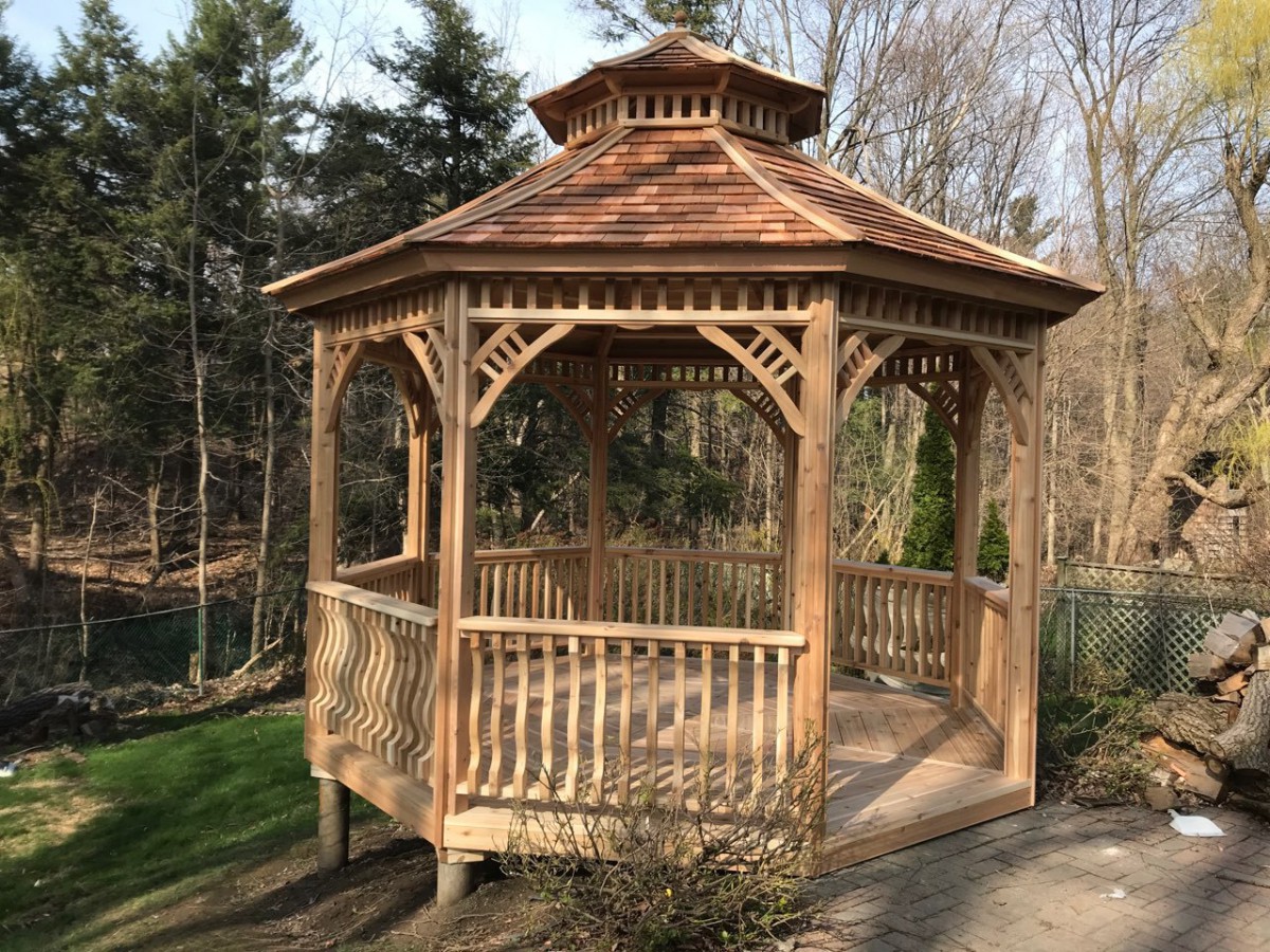 Backyard gazebo design 12' with cedar shingles and a cupola on top as seen from the side. Id number 5736.