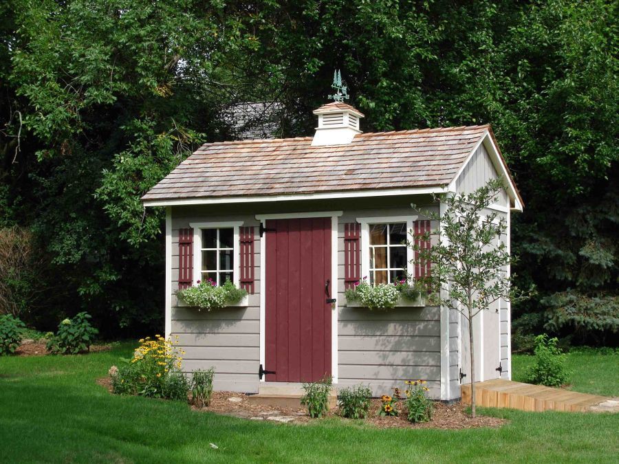 Palmerston garden shed plan 8x12 with cedar shingles in a yard- front3. ID number 5504