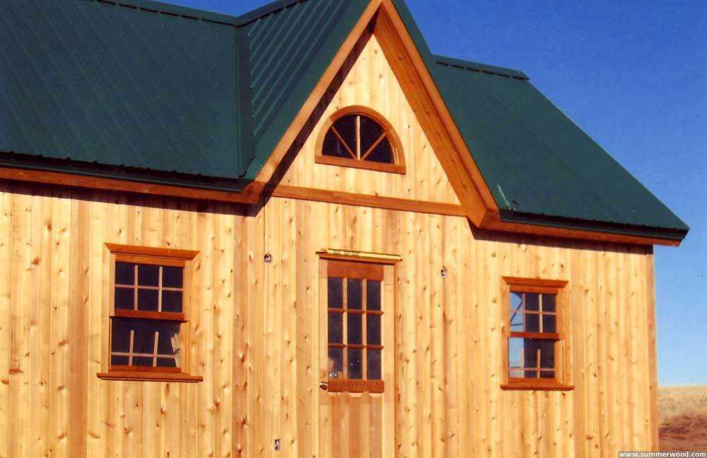Backyard cedar breckenridge cabin design 14x24 with deluxe single door as seen from below. ID number 2839.