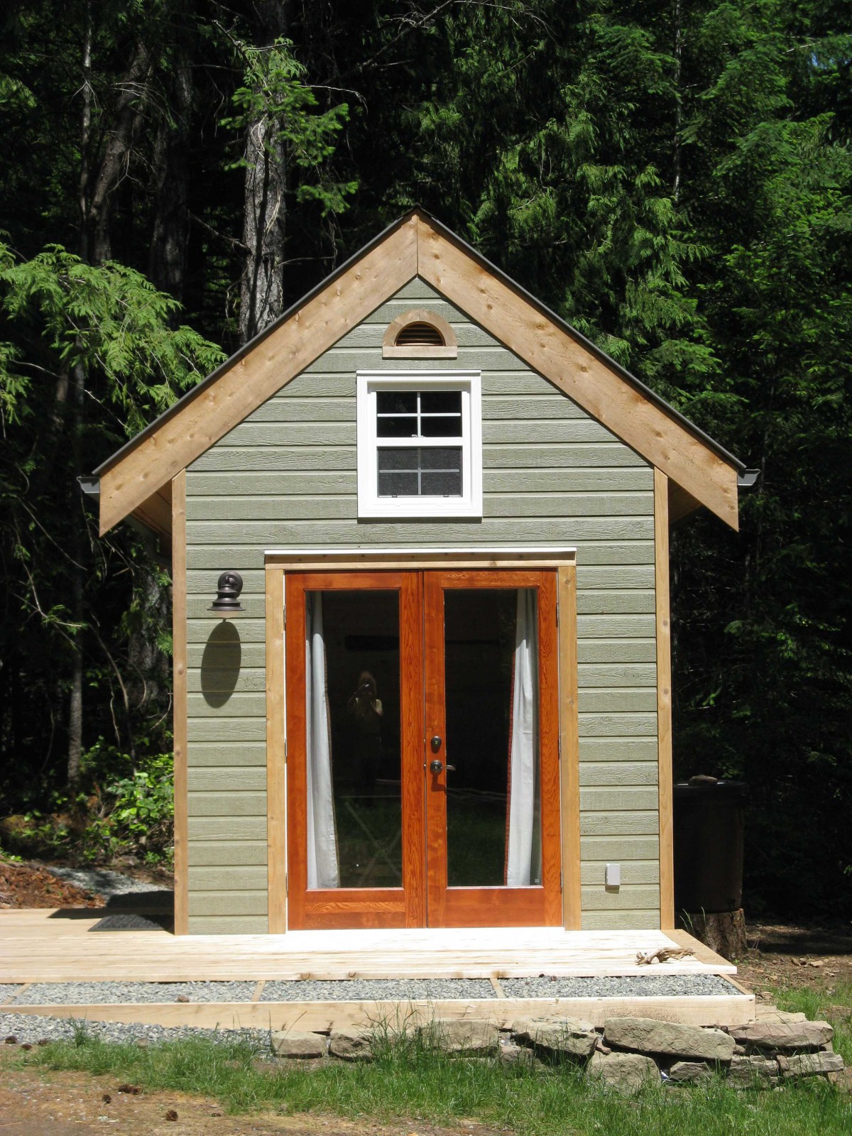 Telluride Wood Workshop design in the garden 9x12 with large single hung window seen from the right. ID number 2887.