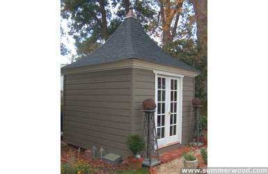 Melbourne shed plan 10 x 10 in a backyard with black finial seen from the left. ID number 1999-2