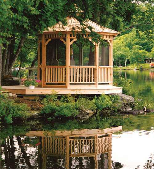 Monterey gazebo design 8' beside a lake with natural finish seen from front.ID number 3123-2.