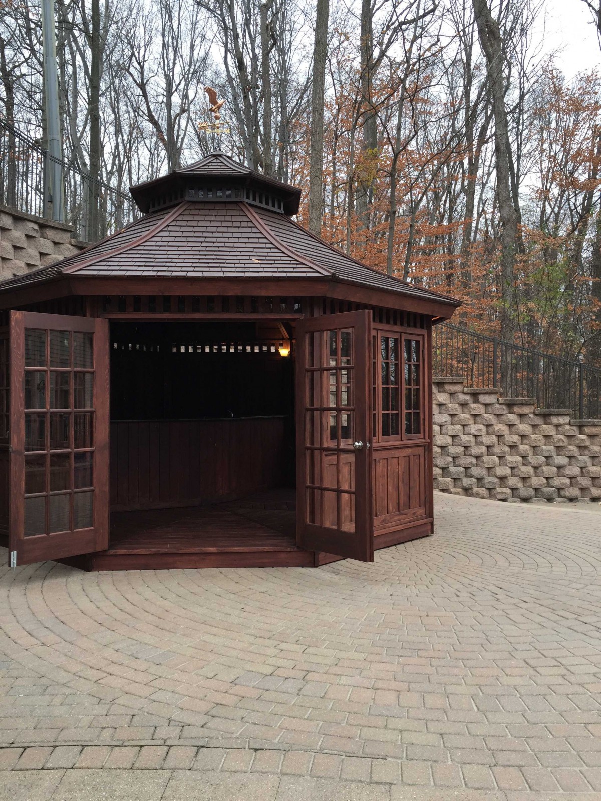 San cristobal gazebo design 16' before woods with weathervanes seen from front.ID number 3133-4.
