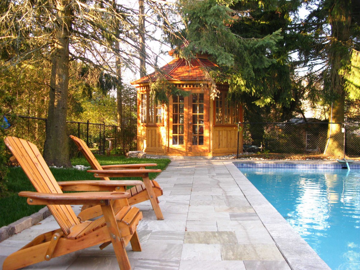 San cristobal gazebo design 12' beside pool with stained finish seen from front.ID number 3420-4.