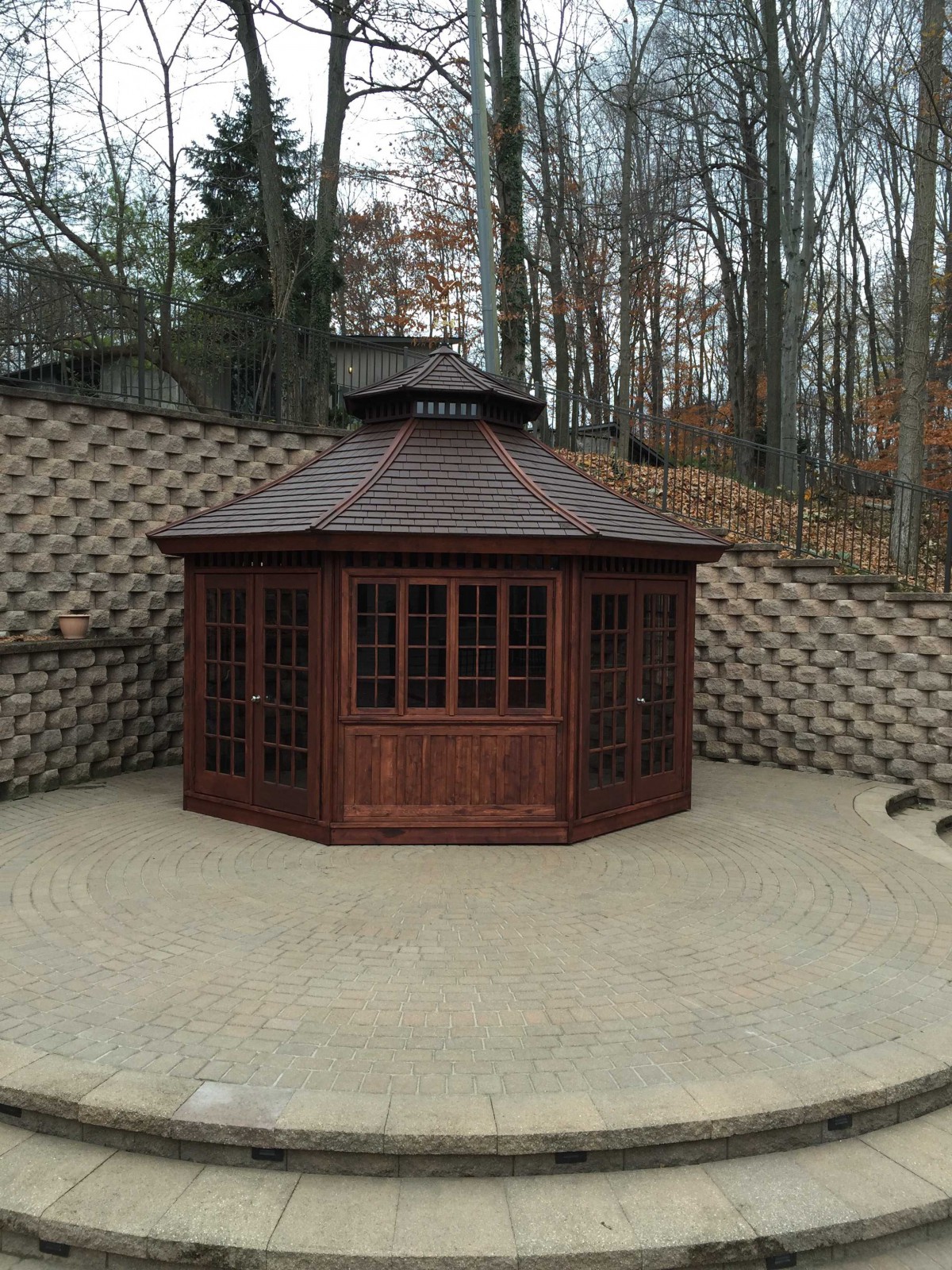San cristobal gazebo design 16' before woods with weathervanes seen from front.ID number 3133-2.