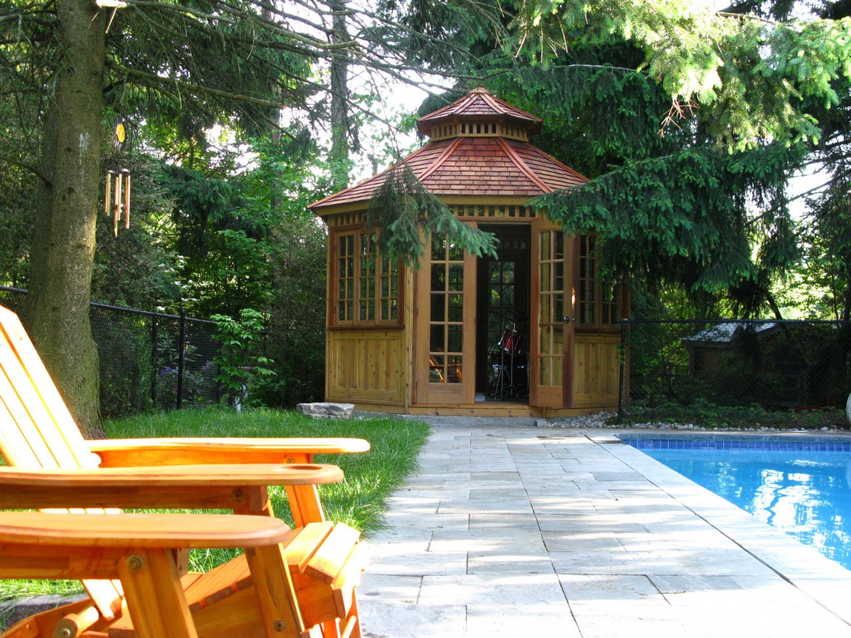San cristobal gazebo design 12' beside pool with stained finish seen from front.ID number 3420-1.