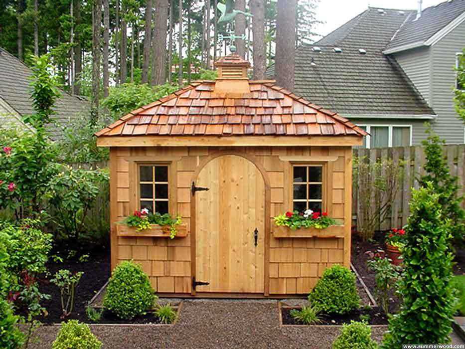 Sonoma shed design 8 x 10 in a backyard with a cupola seen from the front. ID number 2986