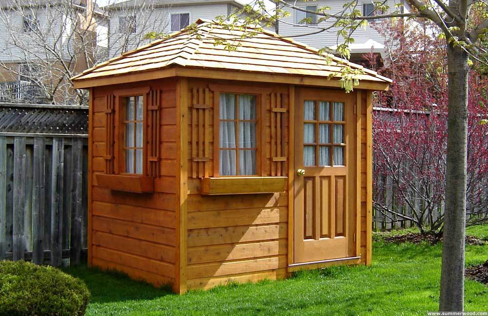 Sonoma small garden shed 6x8 with deluxe door in a backyard. ID number