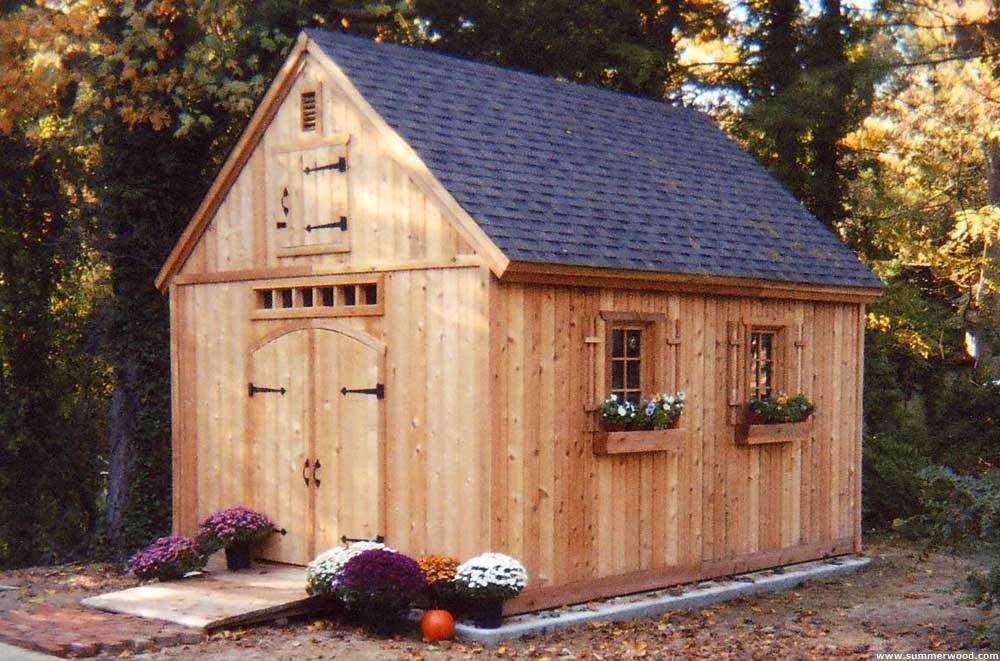 Palmerston shed plan 12 x 16 with double arched doors in a backyard seen from the side. ID number 3288-4.