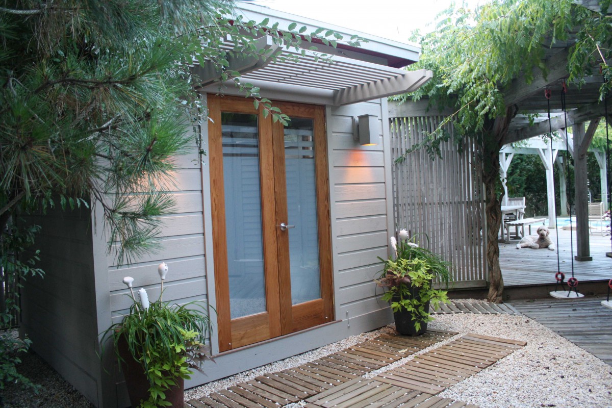 Cedar urban studio home studio design 8  x  10 in a backyard with double door seen from left.ID number 3438-6.