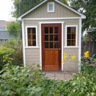 Canexel Palmerstone Shed design 8' x 8' in the backyard with a single door in the front. ID number 5722