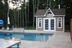 Copper creek pool cabana design 8 x 14 with metal French double doors in a backyard seen from the front. ID number 1845-3.