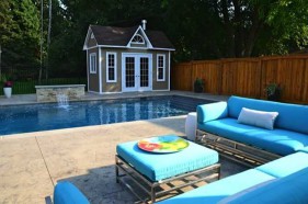 Copper creek pool cabana design 8 x 14 with metal French double doors in a backyard seen from the front. ID number 1845-3.