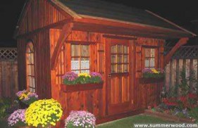 Glen echo shed design 8 x 12 in a backyard with flower boxes seen from the side. ID number 1953-2