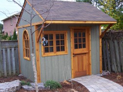 Glen echo shed plan 8 x 10 with beautiful surroundings in a backyard seen from the left side. ID number 3006-2.