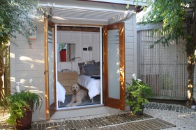 Cedar urban studio home studio design 8  x  10 in a backyard with double door seen from front.ID number 3438-3.