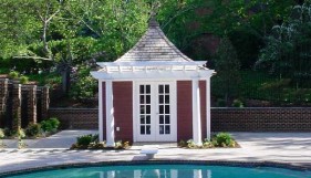Canexel Melbourne pool cabana design 12x12 with French double doors by the pool seen from the front. ID number 3026-103.