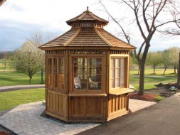 San cristobal gazebo design 10' beside a lake with cedar shingles seen from front.ID number 3416-2.