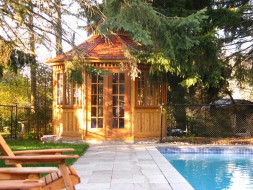 San cristobal gazebo design 12' beside pool with stained finish seen from front.ID number 3420-3.