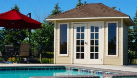 Sonoma pool house plan 8x10 with sidelite windows and curved double french doors by a poolside seen from the front. ID number 5624-1