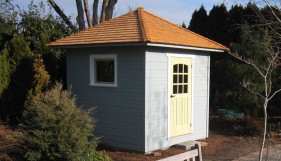 Sonoma shed design 6 x 8 in a yard with a large workshop window seen from the left side. ID number 2766-3