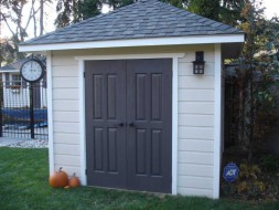 Sonoma shed plan 8 x 8 backyard studio design with a double solid deluxe door seen from the left. ID number 2992-4