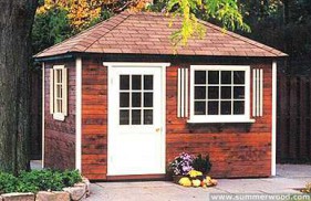 Sonoma shed plan 7 x 10 in a yard with a deluxe door seen from the left. ID number 2905