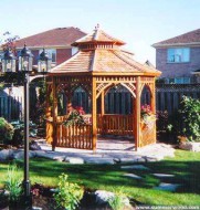 Victorian gazebo design 10' in a garden with omit floor  seen from left.ID number 3437-2.