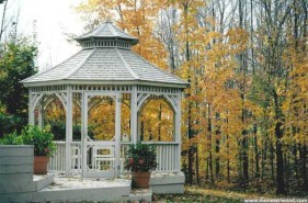 Victorian gazebo design 12' beside woods with screenkit seen from front.ID number 3448-1.
