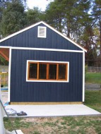 Glen Echo backyard studio design 12x18 with wood vents in the outdoor seen from the left. ID number 3081.