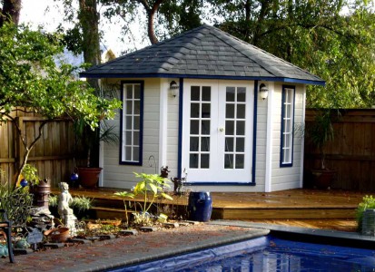 Catalina pool cabana design 9 ft with French double doors by a pool seen from the front. ID number 3320-1.
