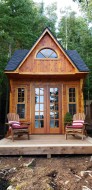 Cedar Balabunkie rustic cabin plan 10' x 10' facing ocean with French lite double doors as seen from the front. ID number 5724-1