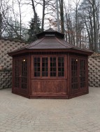 San CriSan cristobal gazebo design 16' before woods with weathervanes seen from front.ID number 3133-1.