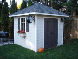 Sonoma shed plan 8 x 8 backyard studio design with a double solid deluxe door seen from the left. ID number 2992-4